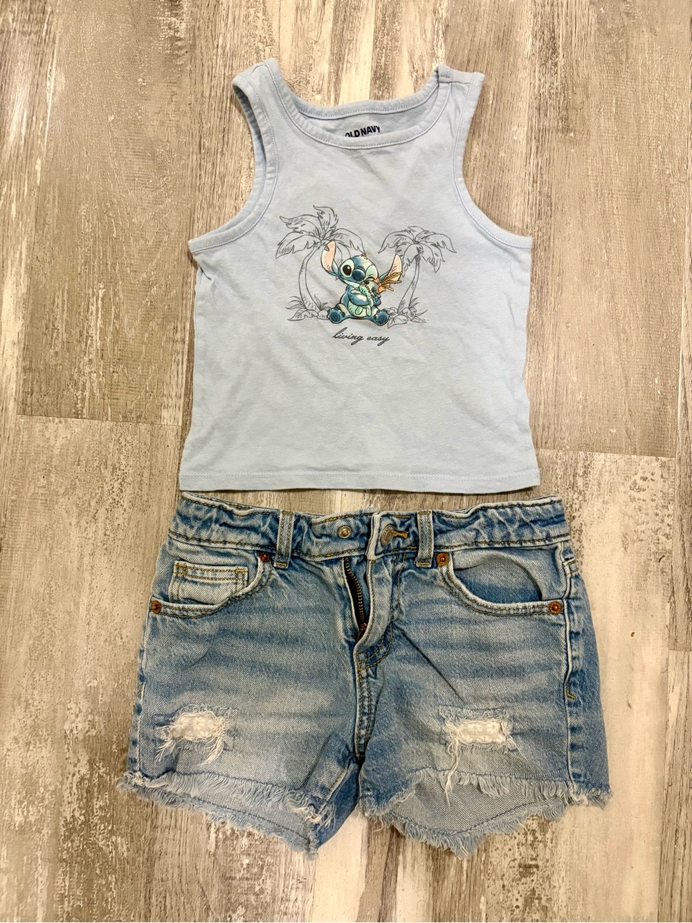 Light Blue Stitch Graphic Tank Top with denim shorts outfit